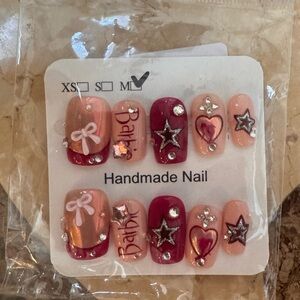 12 New packs of luxury fake nails. 10 to 24 count in each pack. Some 3D nails